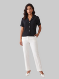 Blusa negra de lunares blancos