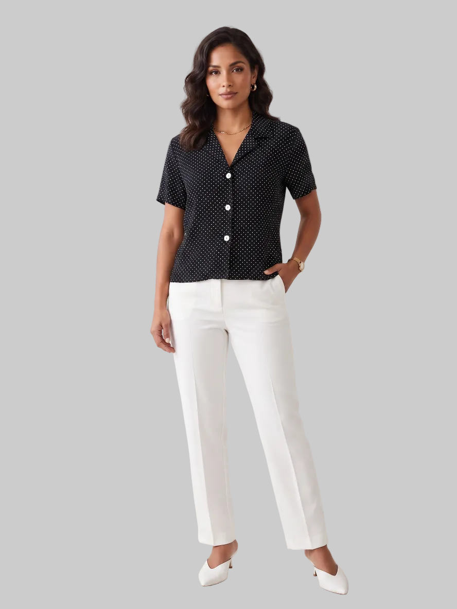 Blusa negra de lunares blancos